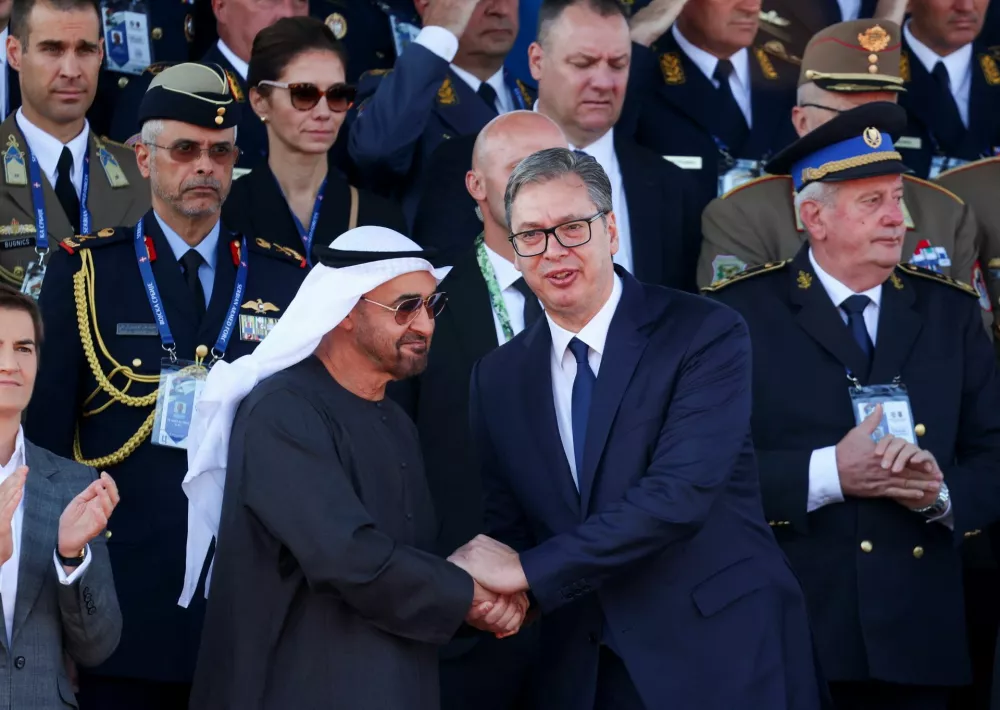 Serbian President Aleksandar Vucic and Mohamed bin Zayed Al Nahyan attend a military parade in Belgrade, Serbia, September 20, 2025. REUTERS/Zorana Jevtic