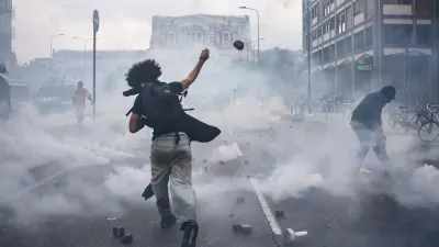 22 September 2025, Italy, MilanDemonstrators hurl stones towards Police forces during clashes at a pro-palestine demonstration in Milan. A nationwide strike in solidarity with the people of Gaza caused disruptions across Italy on Monday. PhotoClaudio Furlan/LaPresse via ZUMA Press/dpa