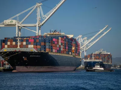 A cargo ship full of shipping containers is seen at the port of Oakland, California, U.S., August 4, 2025. REUTERS/Carlos Barria