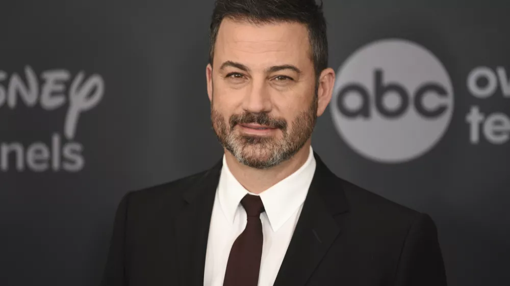 FILE - Jimmy Kimmel appears at the Walt Disney Television upfront in New York on May 14, 2019. (Photo by Evan Agostini/Invision/AP, File)