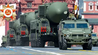 FILE - In this file photo taken on Wednesday, June 24, 2020, Russian RS-24 Yars ballistic missiles roll in Red Square during the Victory Day military parade marking the 75th anniversary of the Nazi defeat in Moscow, Russia. Russia and the United States exchanged documents Tuesday Jan. 26, 2021, to extend the New START nuclear treaty, their last remaining arms control pact, the Kremlin said. The Kremlin readout of a phone call between U.S. President Joe Biden and Russian President Vladimir Putin said they voiced satisfaction with the move. (AP Photo/Alexander Zemlianichenko, File)