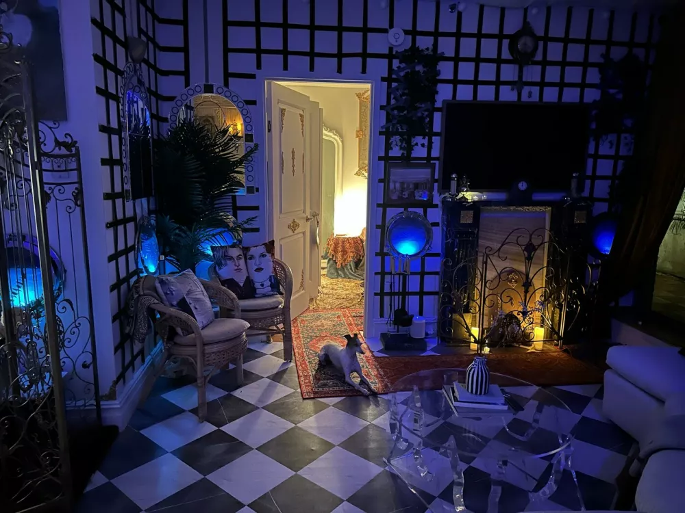 Story from Jam Press (Titanic Decorated Apartment)Pictured: Inside the Titanic home.Woman who has seen Titanic hundreds of times turns FLAT into ship replica with iceberg &ndash; and invites HINGE date overA woman has turned her flat into the TITANIC complete with a grand staircase and an iceberg &ndash; and she even invited her Hinge date round for a tour.Superfan Sarah Boll has spent months transforming her two-bed rental into a full-blown tribute to the doomed liner &ndash; and she's gone full steam ahead.The 27-year-old says what started as an idea for a small themed party quickly spiralled into an obsession.Now her walls, ceilings and even her bedroom have been revamped to recreate the ship's most famous rooms.From portholes to a "sinking room" and replica artefacts, every room has been styled to make you feel like you're stepping back into 1912."I've been a huge Titanic fanatic, to say the least, since I was 11," the model and a real estate agent told What's The Jam."For my high school graduation, my dad gave me a model ship of the Titanic, and my mom shipped it to me when I had space for it."I was going to have a small Titanic party, but once I started decorating, it was difficult to stop &ndash; especially after I started posting videos on TikTok.'Also, I just love interior design and anything to do with shades of blue and water."Sarah started decorating her New York City apartment in March 2025.Step inside and you're greeted by her version of the Grand Staircase, built with stick-on tiles, plastic ceiling panels and even a salad bowl turned into the glass dome.There are velvet ribbon walls, gold trim, faux greenery and mirrors dressed up as caf&eacute; windows.Sarah says her friends and family have been stunned by the transformation &ndash; but none more so than her Hinge date, who got the full Titanic tour when he came over to visit.She said: "He was totally on board. I told him about my apartment before he came over and asked if he would be okay if I filmed his reaction. He was so chill about it."The reactions from everyone else have been hilarious. Some people like it and others think it's insane."It's been 50/50 &ndash; there's been a lot of, 'I can't decide if she's cool or needs to be institutionalised'"Sarah says the real showstopper is her "sinking room", where visitors can first see Titanic sailing on a starry night before it hits the iceberg.Walking into the room, a model ship dangles from the ceiling mid-sink while a dresser painted to look like the liner appears to go down beneath the waves.The floor shimmers with mirrored silver paper like water, fabric drapes create the feel of being underwater and mini replicas show the wreck on the seabed.Sarah has even filled drawers with sand and crockery to echo what divers found.The bathroom continues the theme, covered in mirrored paper and newspaper clippings, with all 1,500 victims' names written out and stuck on the walls.Meanwhile, her bedroom has been styled as a first-class suite, complete with a gold comforter and a porthole by the bed.Sarah admits the whole thing came together impulsively &ndash; with no real plan &ndash; and she hasn't even kept track of how much it cost.She's since built a following of 18,000 online by sharing TikTok tours of her ship-shaped flat, with viewers torn between calling her a genius or saying she's lost the plot.And while Sarah says she may eventually change her apartment theme, for now she's staying firmly on board the Titanic &ndash; enjoying what she calls the best summer of her life.She said: "I'll switch up the theme eventually; I'm planning on an Alice in Wonderland theme."I'm not sure when I'll do that though. I want my parents to see Titanic first."I love my apartment &ndash; I've never had a better summer in my life."ENDSEDITOR'S NOTE: Video Usage Licence: (EXCLUSIVE) We have obtained an exclusive licence from the copyright holder. A copy of the licence is available on request.Video Restrictions: None.,Image: 1035233146, License: Rights-managed, Restrictions: EDITOR'S NOTE: Video Usage Licence: (EXCLUSIVE) We have obtained an exclusive licence from the copyright holder. A copy of the licence is available on request.Video Restrictions: None., Model Release: no