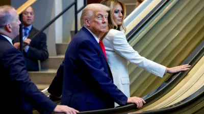 U.S. President Donald Trump and first lady Melania Trump ride an escalator as they arrive to attend the 80th United Nations General Assembly, in New York City, New York, U.S., September 23, 2025. REUTERS/Kylie Cooper TPX IMAGES OF THE DAY