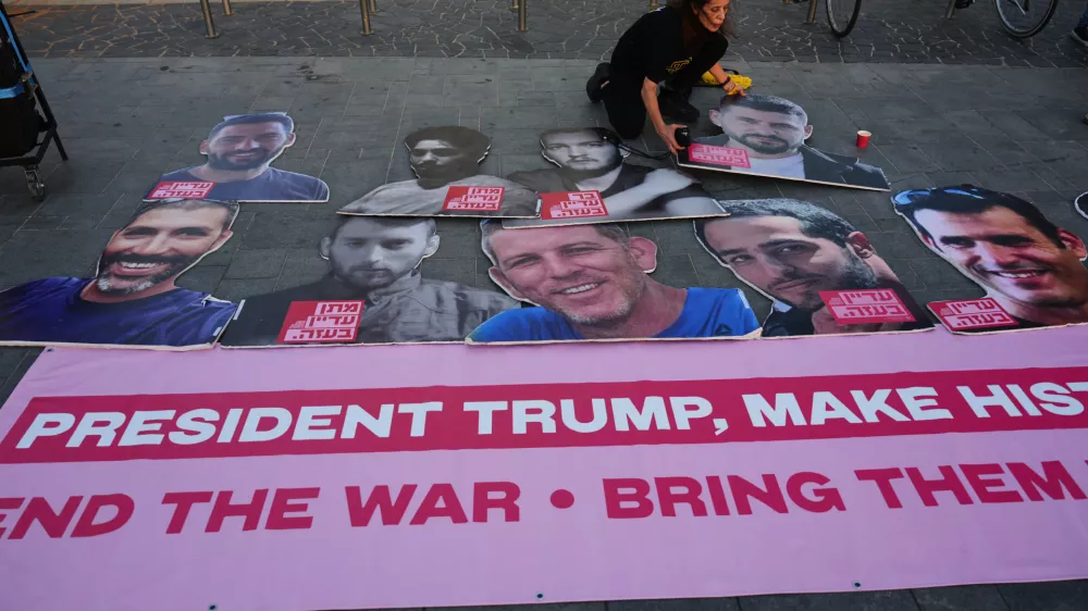 Relatives and supporters of hostages held by Hamas in the Gaza Strip calling for their immediate release and an end of the ongoing war, in front of the U.S. Embassy branch office in Tel Aviv, Israel, Monday, Sept. 29, 2025, During the meeting between U.S. President Donald Trump and Israeli Prime Minister Benjamin Netanyahu in the White House. (AP Photo/Ariel Schalit)