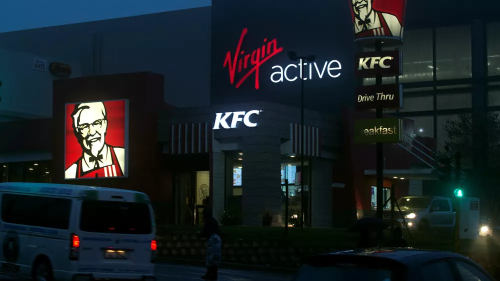 A KFC store is seen next door to a Virgin Active gym in Hillcrest, South Africa September 28, 2017. REUTERS/Rogan Ward