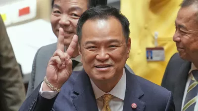 Thailand's Prime Minister Anutin Charnvirakul reacts before he presents the policy statement at the Parliament in Bangkok, Thailand, Monday, Sept. 29, 2025. (AP Photo/Sakchai Lalit)