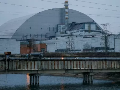 FILE PHOTO: A general view shows the New Safe Confinement (NSC) structure over the old sarcophagus covering the damaged fourth reactor at the Chernobyl Nuclear Power Plant in Chernobyl, Ukraine November 22, 2018. Picture taken November 22, 2018. REUTERS/Gleb Garanich/File Photo