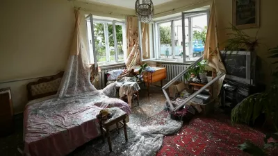 Shattered glass on the floor inside a room of a house damaged during a Russian drone and missile strike, amid Russia's attack on Ukraine, in the village of Lapaivka on the outskirts of Lviv, Ukraine October 5, 2025. REUTERS/Stringer