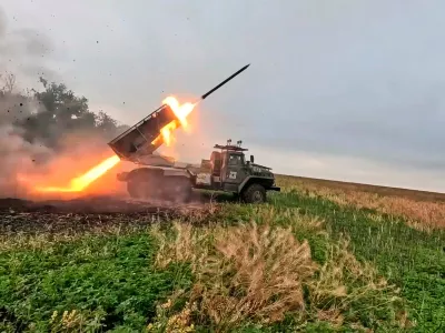 In this photo taken from video distributed by Russian Defense Ministry Press Service on Monday, Oct. 6, 2025, a Russian "Grad" self-propelled 122 mm multiple rocket launcher fires towards Ukrainian positions on an undisclosed location in Ukraine. (Russian Defense Ministry Press Service via AP)