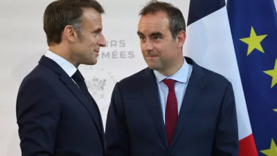 FILE - Then French Defense minister Sebastien Lecornu, right, and France's President Emmanuel Macron talk at the end of an address by the president to army leaders in Paris Sunday July 13, 2025, (Ludovic Marin, Pool via AP, File)