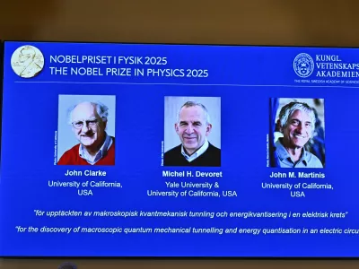 Photos of John Clarke, Michel H Devoret and John M. Martinis are pictured on a screen after they were announced as winners of the Nobel Prize in Physics, at the Nobel Assembly of the Karolinska Institutet, in Stockholm, Sweden, Tuesday, Oct. 7, 2025. (Christine Olsson/TT News Agency via AP)