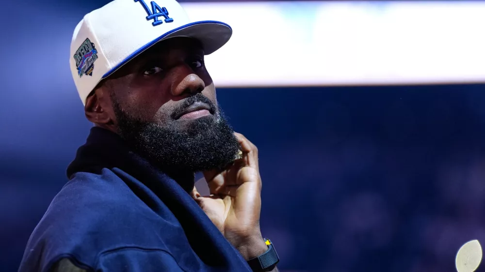 Los Angeles Lakers' Lebron James stands on the court before an NBA basketball preseason game against the Golden State Warriors, Sunday, Oct. 5, 2025, in San Francisco. (AP Photo/Godofredo A. V&aacute;squez)