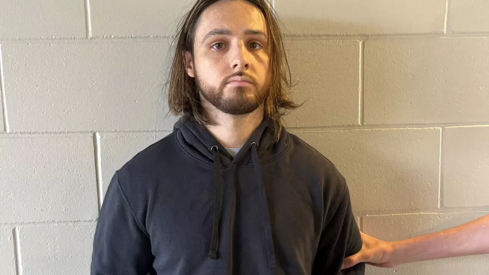 Jonathan Rinderknecht, 29, is posed after his arrest on charges that he intentionally ignited the Pacific Palisades Fire in Los Angeles, before his first court appearance in Orlando, Florida, U.S. October 8, 2025. Department of Justice/Handout via REUTERS  THIS IMAGE HAS BEEN SUPPLIED BY A THIRD PARTY. THIS PICTURE WAS PROCESSED BY REUTERS TO ENHANCE QUALITY. AN UNPROCESSED VERSION HAS BEEN PROVIDED   TPX IMAGES OF THE DAY