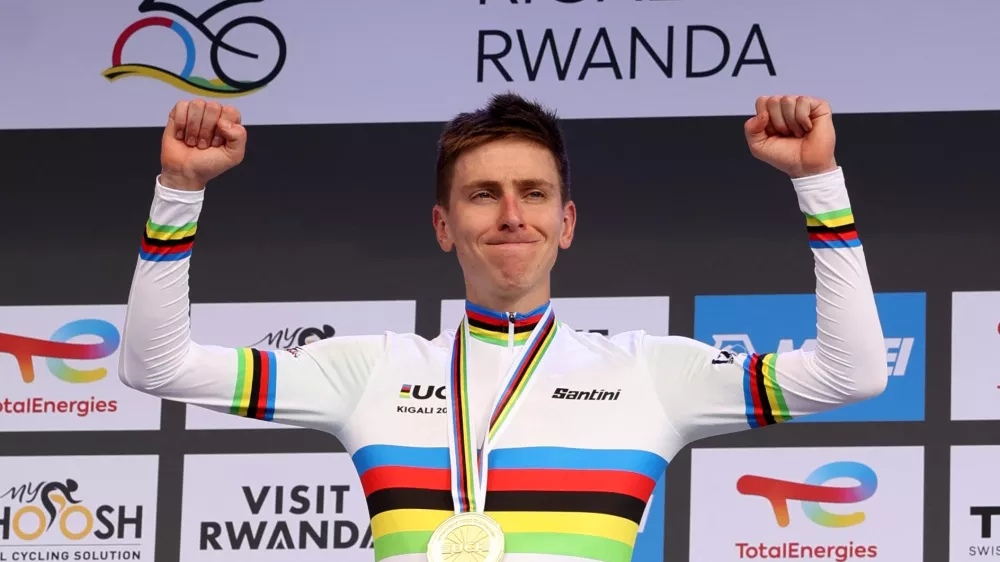 Cycling - Road World Championships 2025 - Kigali, Rwanda - September 28, 2025 Slovenia's Tadej Pogacar celebrates on the podium after winning the Men's Elite Road Race REUTERS/Jean Bizimana
