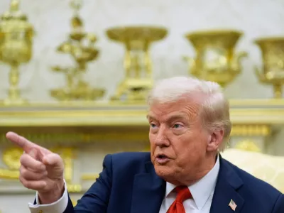 President Donald Trump calls on a reporter to ask a question during a meeting with Finland's President Alexander Stubb in the Oval Office at the White House, Thursday, Oct. 9, 2025, in Washington. (AP Photo/Alex Brandon)