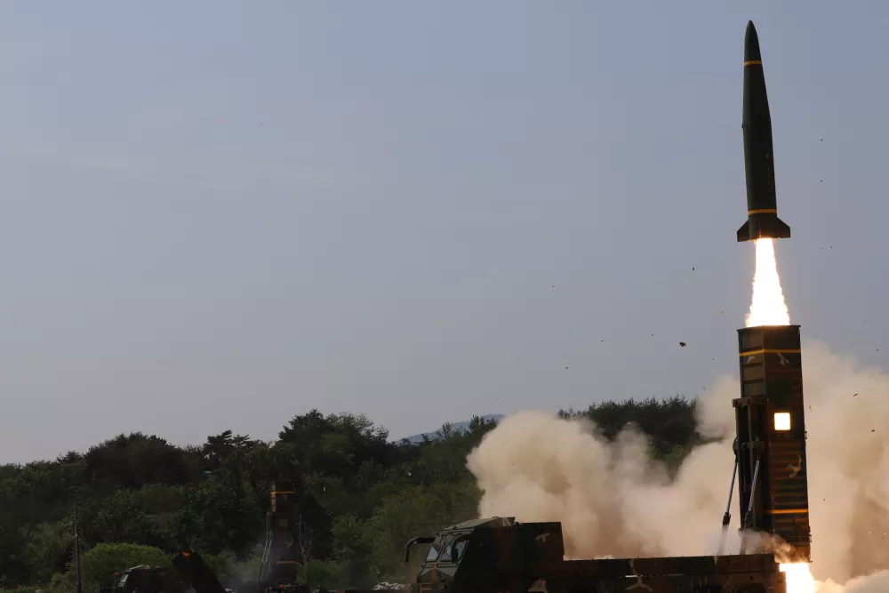 In this photo provided by South Korea Defense Ministry, a missile is fired during a joint training between U.S. and South Korea at an undisclosed location in South Korea, Wednesday, May 25, 2022. North Korea test-launched a suspected intercontinental ballistic missile and two shorter-range weapons into the sea Wednesday, South Korea said, hours after President Joe Biden ended a trip to Asia where he reaffirmed the U.S. commitment to defend its allies in the face of the North's nuclear threat. (South Korea Defense Ministry via AP)
