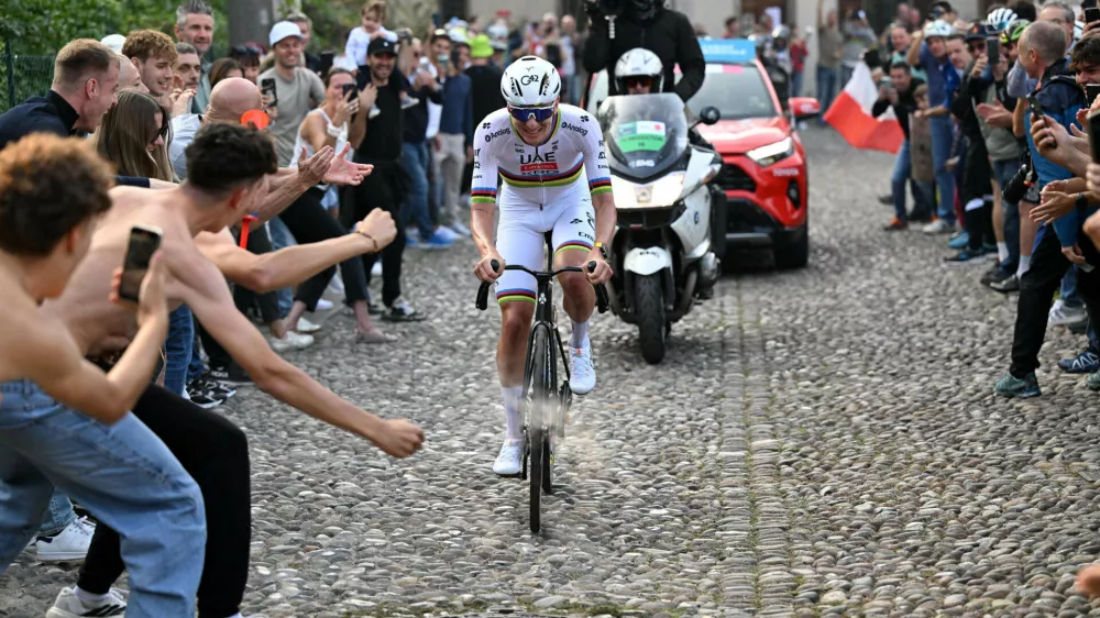 Reigning World Champion Tadej Pogacar pedals on his way to win Il Lombardia, Tour of Lombardy cycling race, in Bergamo, Italy, Saturday, Oct. 11, 2025. (Luca Bettini, LaPresse Pool via AP)