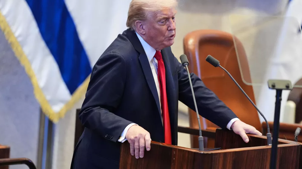 President Donald Trump speaks to the Knesset, Israel's parliament, Monday, Oct. 13, 2025, in Jerusalem. (AP Photo/Evan Vucci, Pool)