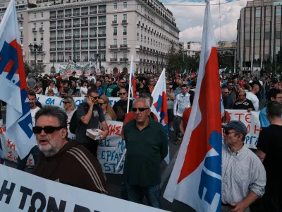 Protesters take part in a nationwide 24-hour strike in Athens, Greece, Wednesday, Oct. 1, 2025, as labor unions demand higher wages and the withdrawal of a bill changing work hours. (AP Photo/Thanassis Stavrakis)