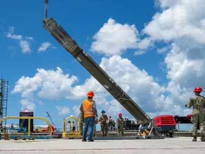 NAVAL BASE GUAM (May 6, 2025) &ndash; Sailors assigned to Navy Munitions Command Pacific, East Asia Division, Unit Guam load UGM-109 Tomahawk missiles onto the Los Angeles-class fast-attack submarine USS Jefferson City (SSN 759), May 6, 2025. Assigned to Commander, Submarine Squadron 15 at Polaris Point, Naval Base Guam, Jefferson City is one of five fast-attack submarines forward-deployed in the Pacific. Renowned for their unparalleled speed, endurance, stealth, and mobility, fast-attack submarines serve as the backbone of the Navy's submarine force, ensuring readiness and agility in safeguarding maritime interests around the world. (U.S. Navy photo by Lt. James Caliva),Image: 1017624832, License: Rights-managed, Restrictions:, Model Release: no