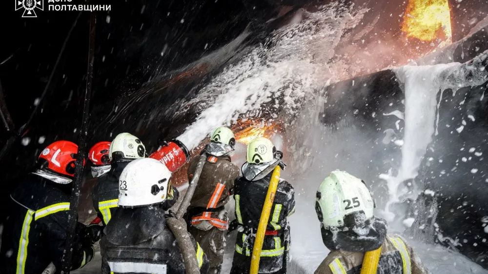Firefighters work at the site where an energy infrastructure enterprise was hit during overnight Russian missile and drone strikes, amid Russia's attack on Ukraine, in Poltava region, Ukraine October 16, 2025. Press service of the State Emergency Service of Ukraine in Poltava region/Handout via REUTERS ATTENTION EDITORS - THIS IMAGE HAS BEEN SUPPLIED BY A THIRD PARTY. DO NOT OBSCURE LOGO.
