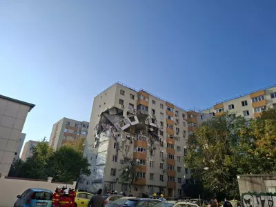In this photograph made available by the Romanian Emergency Services, a view of a damaged apartment building after a powerful explosion in a residential block in Bucharest, Romania, Friday, Oct. 17, 2025. (Romanian Emergency Services via AP)