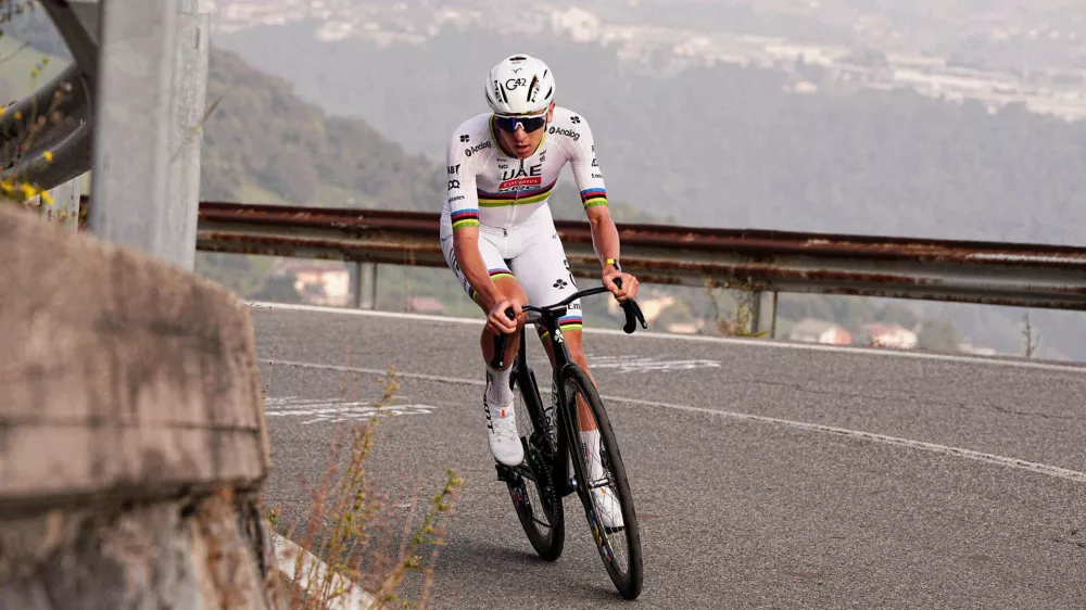 Reigning World Champion Tadej Pogacar pedals on his way to win Il Lombardia, Tour of Lombardy cycling race, in Bergamo, Italy, Saturday, Oct. 11, 2025. (Marco Alpozzi/LaPresse via AP)
