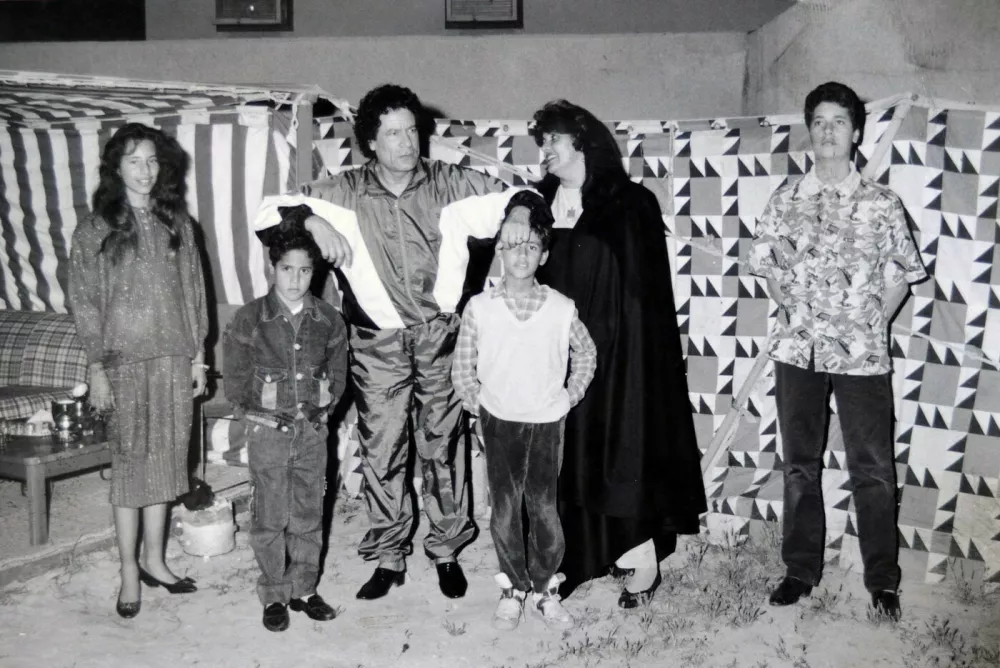 B&W familyAisha, Khamis, dad Muammar Gaddafi, Hannibal, mum Safia, Mutassim.Photo albums and videos giving a glimpse into rarely seen aspects of the Gaddafi family's life have been discovered in Muammar Gaddafi's compound in Tripoli and other homes around Libya. Several members of Gaddafi's family are believed to have crossed the border into Algeria./Credit:BIRRELL/SIPA/1109152044,Image232774733, LicenseRights-managed, Restrictions***ON LINE***SAUF GB***, Model Releaseno