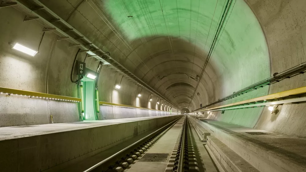 In this image released on Monday, Apr. 4, 2016, the tracks of the Gotthard Base Tunnel point to the future of the trans-Alpine railway. The Gotthard Base Tunnel, the longest train tunnel in the world, enters into service on 11 December 2016. Prior to this, the record-breaking construction will be more accessible than ever, but only for a limited period. From 2 August 2016, passengers may descend into the once-in-a-century construction on exclusive tunnel rides - disembarkation in the depths of the mountain included. The special Gottardino train only runs until 27 November 2016 and the number of tickets is limited. For more information visit www.apassignments.com/newsaktuell. (Swiss Travel System AG/obs via AP Images)
