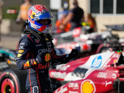 Red Bull driver Max Verstappen of the Netherlands celebrates his pole position after the qualification for the Formula One U.S. Grand Prix race in Austin, Texas, Saturday, Oct. 18, 2025. (AP Photo/John Locher)