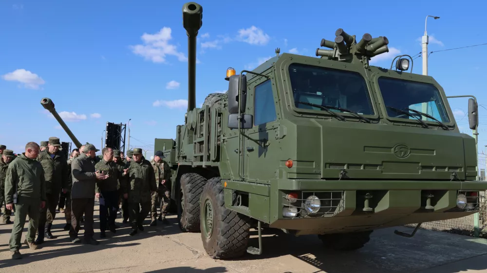 Russian Security Council Deputy Chairman and the head of the United Russia party Dmitry Medvedev looks at advanced weapons during his visit to the Kapustin Yar test range in Astrakhan region, Russia, Saturday, Oct. 18, 2025. (Ekaterina Shtukina, Sputnik, Pool Photo via AP)