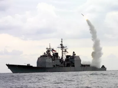 In this photo provided by the U.S. Navy, a Tomahawk Land Attack Missile (TLAM) is launched from the guided missile cruiser USS Cape St. George (CG 71) on March 23, 2003, in the Mediterranean Sea. The USS Cape St. George and USS Gonzalez exchanged gunfire with suspected pirates off the coast of Somalia Saturday, March 18, 2006. (AP Photo/U.S. Navy, Kenneth Moll, HO)