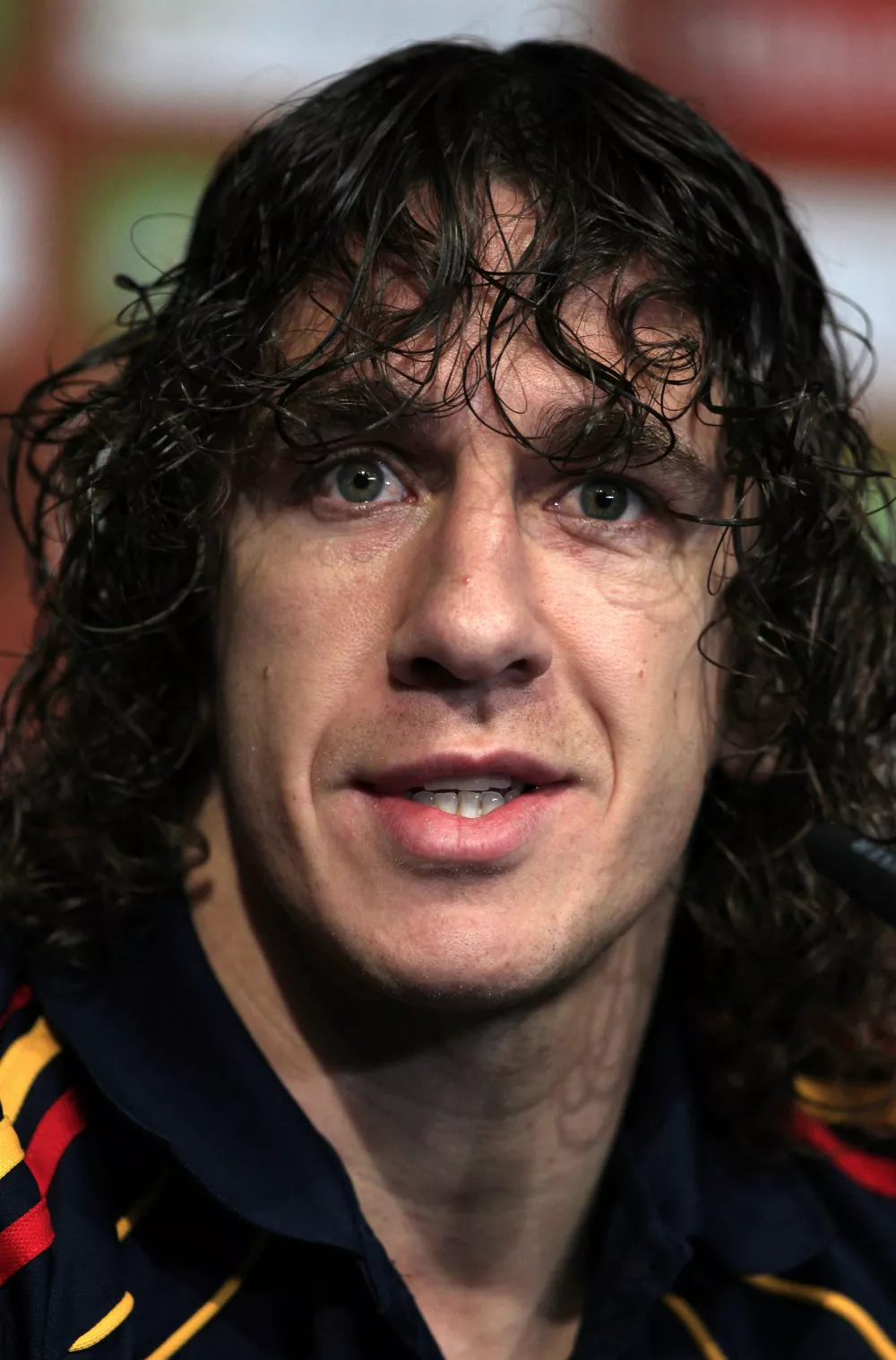 Spain's Carles Puyol attends a news conference in Potchefstroom July 8, 2010. REUTERS/Marcelo del Pozo (SOUTH AFRICA - Tags: SPORT SOCCER WORLD CUP)