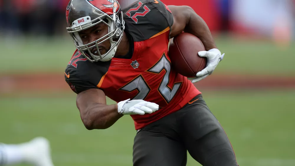 FILE - Tampa Bay Buccaneers running back Doug Martin (22) during the second half of an NFL football game against the New York Jets Sunday, Nov. 12, 2017, in Tampa, Fla. (AP Photo/Jason Behnken,File)