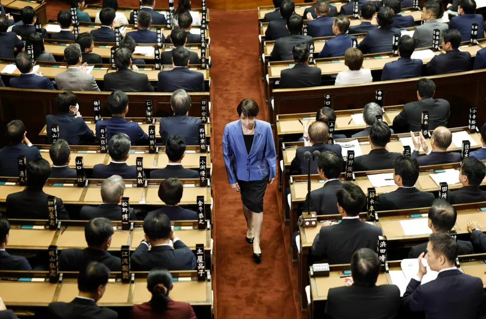 Sanae Takaichi, leader of the ruling Liberal Democratic Party, walks after casting a vote in an election to choose Japan's next prime minister at the Lower House of Parliament in Tokyo, Japan, October 21, 2025. Kyodo/via REUTERS ATTENTION EDITORS - THIS IMAGE WAS PROVIDED BY A THIRD PARTY. EDITORIAL USE ONLY. MANDATORY CREDIT. JAPAN OUT. NO COMMERCIAL OR EDITORIAL SALES IN JAPAN.