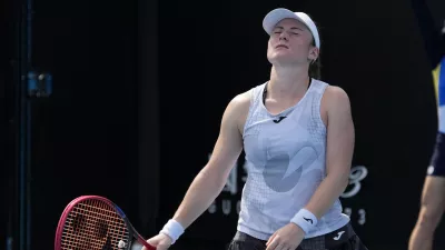 Tamara Zidansek of Slovenia reacts during her first round match against Anastasia Potapova of Russia at the Australian Open tennis championship in Melbourne, Australia, Monday, Jan. 13, 2025. (AP Photo/Manish Swarup)