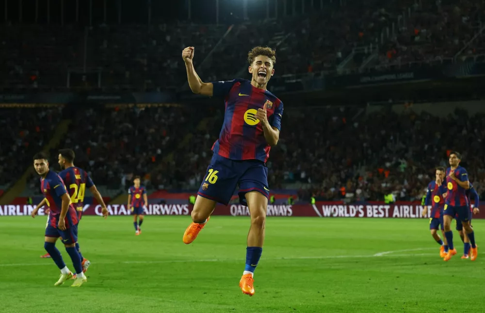 Soccer Football - UEFA Champions League - FC Barcelona v Olympiacos - Estadi Lluis Olimpic Companys, Barcelona, Spain - October 21, 2025 FC Barcelona's Fermin Lopez celebrates scoring their fifth goal REUTERS/Albert Gea