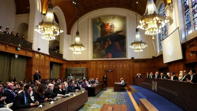Judges, including Yuji Iwasawa, sit the International Court of Justice (ICJ) on the day of a delivery of a non-binding Advisory Opinion on Israel's obligations regarding the presence and activities of the United Nations and other international actors in the occupied Palestinian territory, in a public sitting in The Hague, Netherlands, October 22, 2025. REUTERS/Piroschka van de Wouw