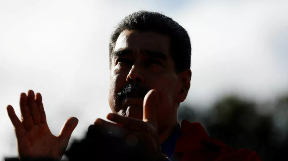 FILE PHOTO: Venezuela's President Nicolas Maduro participates in a demonstration to mark Indigenous Resistance Day, in Caracas, Venezuela, October 12, 2025. REUTERS/Leonardo Fernandez Viloria/File Photo