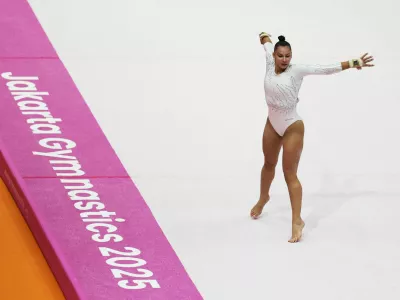 Artistic Gymnastics - 2025 World Artistic Gymnastics Championships - Women's Artistic Gymnastics - All-Around Final - Indonesia Arena, Jakarta, Indonesia - October 23, 2025 Slovenia's Lucija Hribar in action during her floor exercise REUTERS/Issei Kato