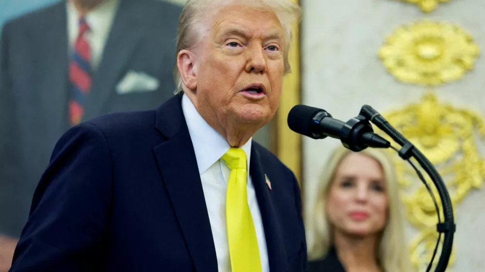 FILE PHOTO: U.S. President Donald Trump speaks during a press conference in the Oval Office at the White House in Washington, D.C., U.S., October 15, 2025. REUTERS/Jonathan Ernst/File Photo