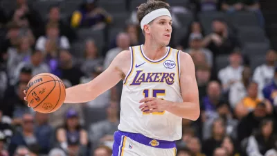 Oct 26, 2025; Sacramento, California, USA; Los Angeles Lakers guard Austin Reaves (15) controls the ball against the Sacramento Kings during the second quarter at Golden 1 Center. Mandatory Credit: Ed Szczepanski-Imagn Images