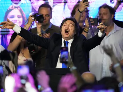 Argentina's President Javier Milei reacts after legislative midterm elections polls closed, in Buenos Aires, Argentina, Sunday, Oct. 26, 2025. (AP Photo/Rodrigo Abd)
