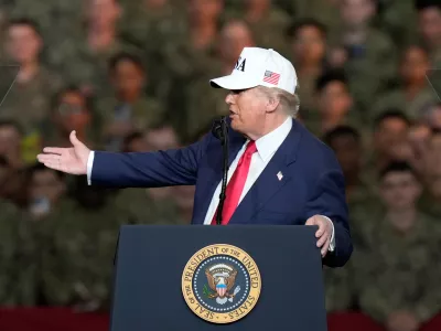 U.S. President Donald Trump speaks to the soldiers and servicemen during his visit to the USS George Washington at the U.S. Navy's Yokosuka base in Yokosuka, south of Tokyo, Tuesday, Oct. 28, 2025. (AP Photo/Eugene Hoshiko)