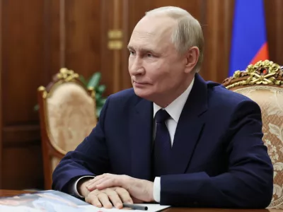 Russian President Vladimir Putin listens to Governor of the Yamal-Nenets Autonomous Area Dmitry Artyukhov during their meeting at the Kremlin, on Tuesday, Oct. 28, 2025. (Alexander Kazakov, Sputnik, Kremlin Pool Photo via AP)