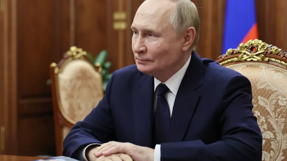 Russian President Vladimir Putin listens to Governor of the Yamal-Nenets Autonomous Area Dmitry Artyukhov during their meeting at the Kremlin, on Tuesday, Oct. 28, 2025. (Alexander Kazakov, Sputnik, Kremlin Pool Photo via AP)