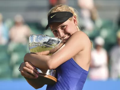 Croatia's Donna Vekic celebrates winning the women's finall on day seven of the Nottingham Open at Nottingham Tennis Centre, England, Sunday June 18, 2017. (Joe Giddens/PA via AP)
