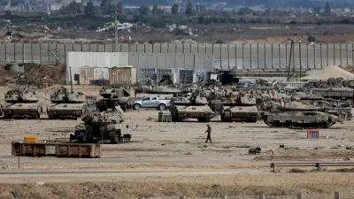 Israeli military personnel operate on the Israeli side of the Israel-Gaza border, on the day the Israeli military said it had resumed enforcing the Gaza ceasefire agreement after a series of strikes across the Gaza Strip, in southern Israel, October 29, 2025. REUTERS/Ammar Awad   TPX IMAGES OF THE DAY