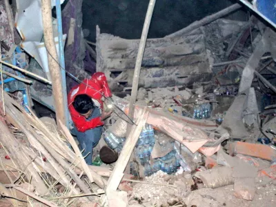 A rescuer works following an earthquake at an unidentified location in Afghanistan, in this handout image released November 3, 2025.  Afghan Red Crescent/Handout via REUTERS  THIS IMAGE HAS BEEN SUPPLIED BY A THIRD PARTY. NO RESALES. NO ARCHIVES. MANDATORY CREDIT   TPX IMAGES OF THE DAY