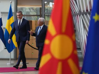 European Council President Antonio Costa, right, walks with North Macedonia's Prime Minister Hristijan Mickoski prior to a meeting at the European Council building in Brussels, Belgium, Tuesday, Nov. 4, 2025. (AP Photo/Virginia Mayo)